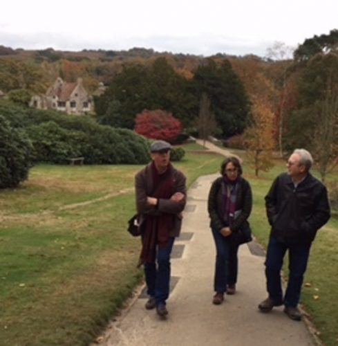 Harold Brown, Anne Boyd Rioux, and David Porteus explore the grounds outside Scotney Castle.