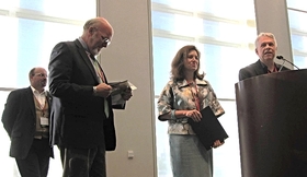 A surprised and touched "Founding Father" receives his awards. To Morris's left is BIO president Brian Jay Jones. To his right are BIO board member Barbara Burkhardt and Will Swift. 